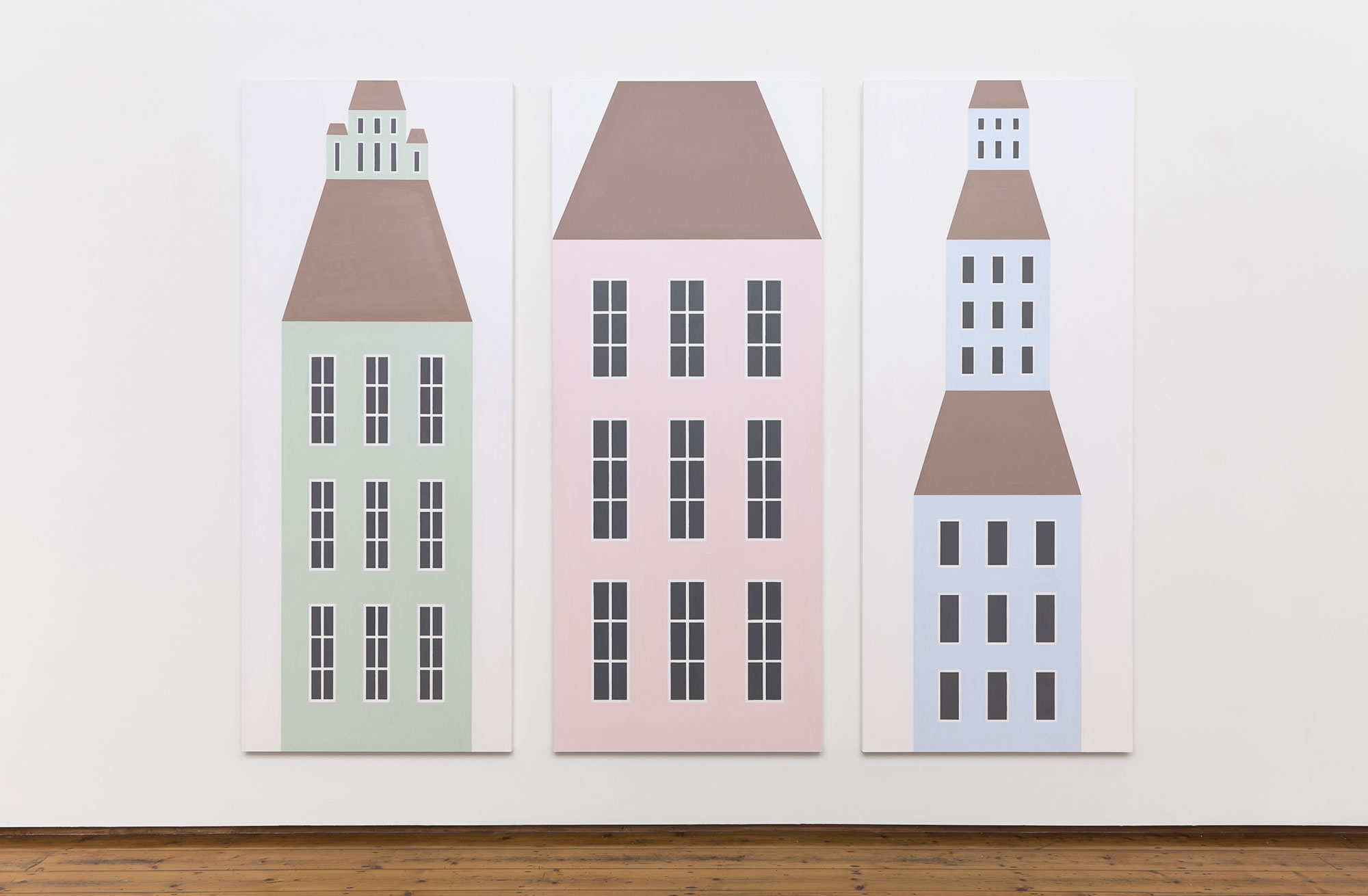 3 hand-drawn pastel townhouses