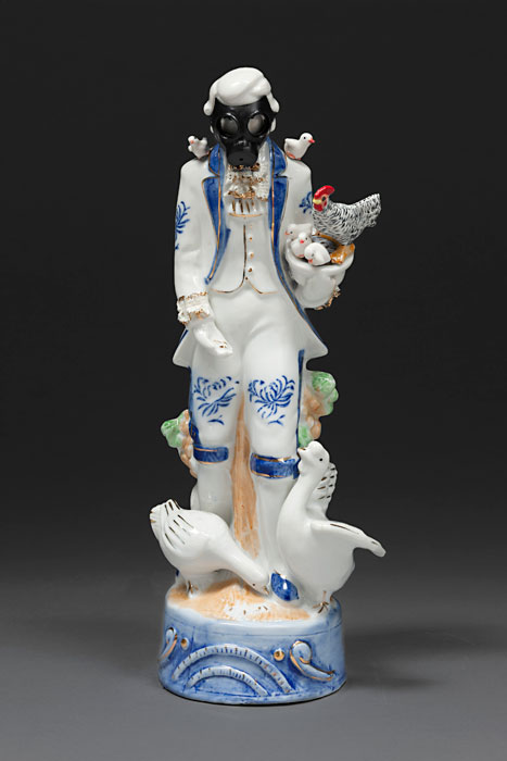 Penny BYRNE 'H5N1 mutant strain' 2011 | porcelain figurine, vintage Action Man gas mask, porcelain chickens, epoxy resin, re-touching medium, powder pigments | Courtesy of the artist, Sullivan+Strumpf Fine Art, Sydney and Fehily Contemporary, Melbourne