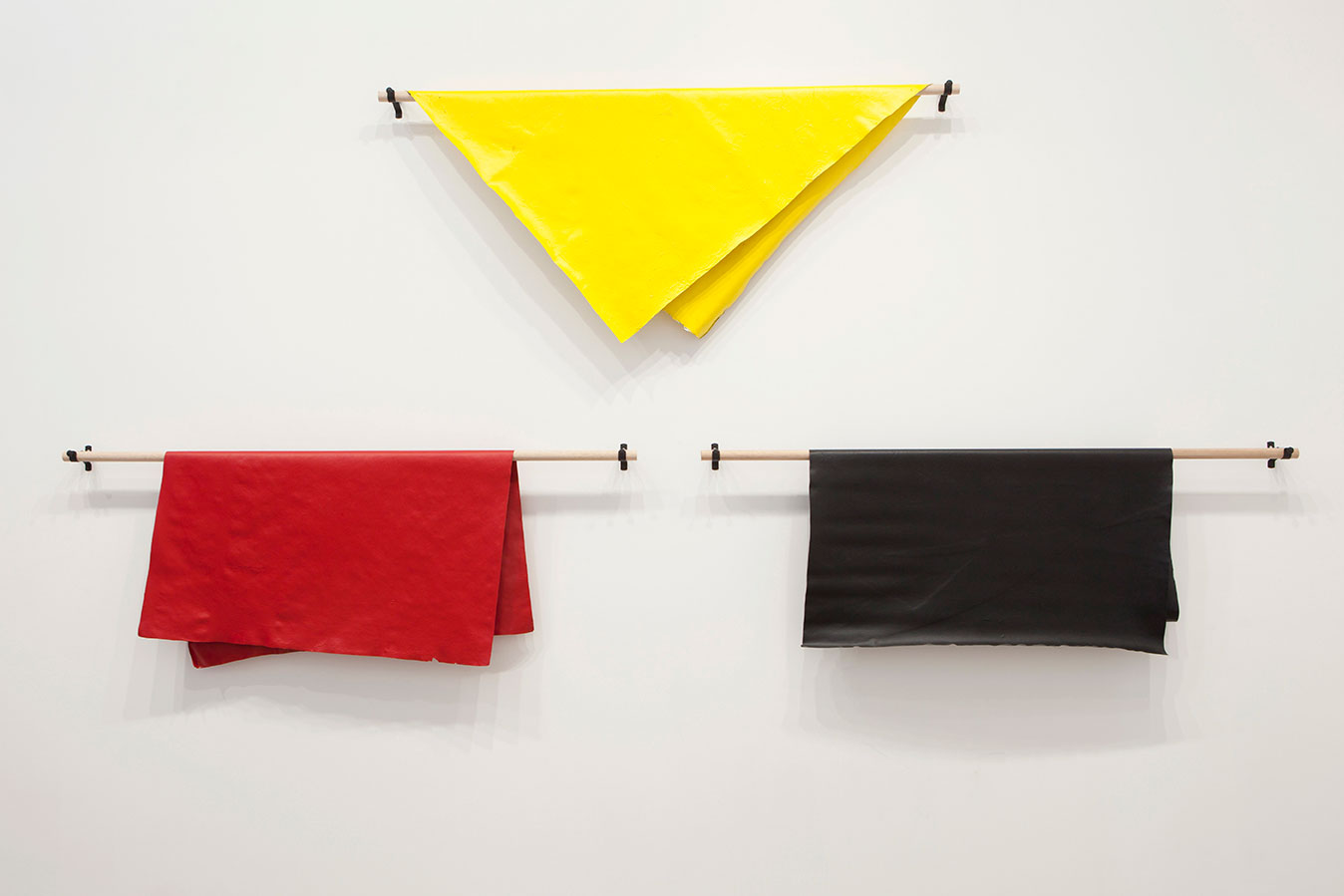 Archie MOORE 'Dermis' 2012, acrylic paint, wooden dowel, steel brackets. QUT Art Collection. Purchased 2012.