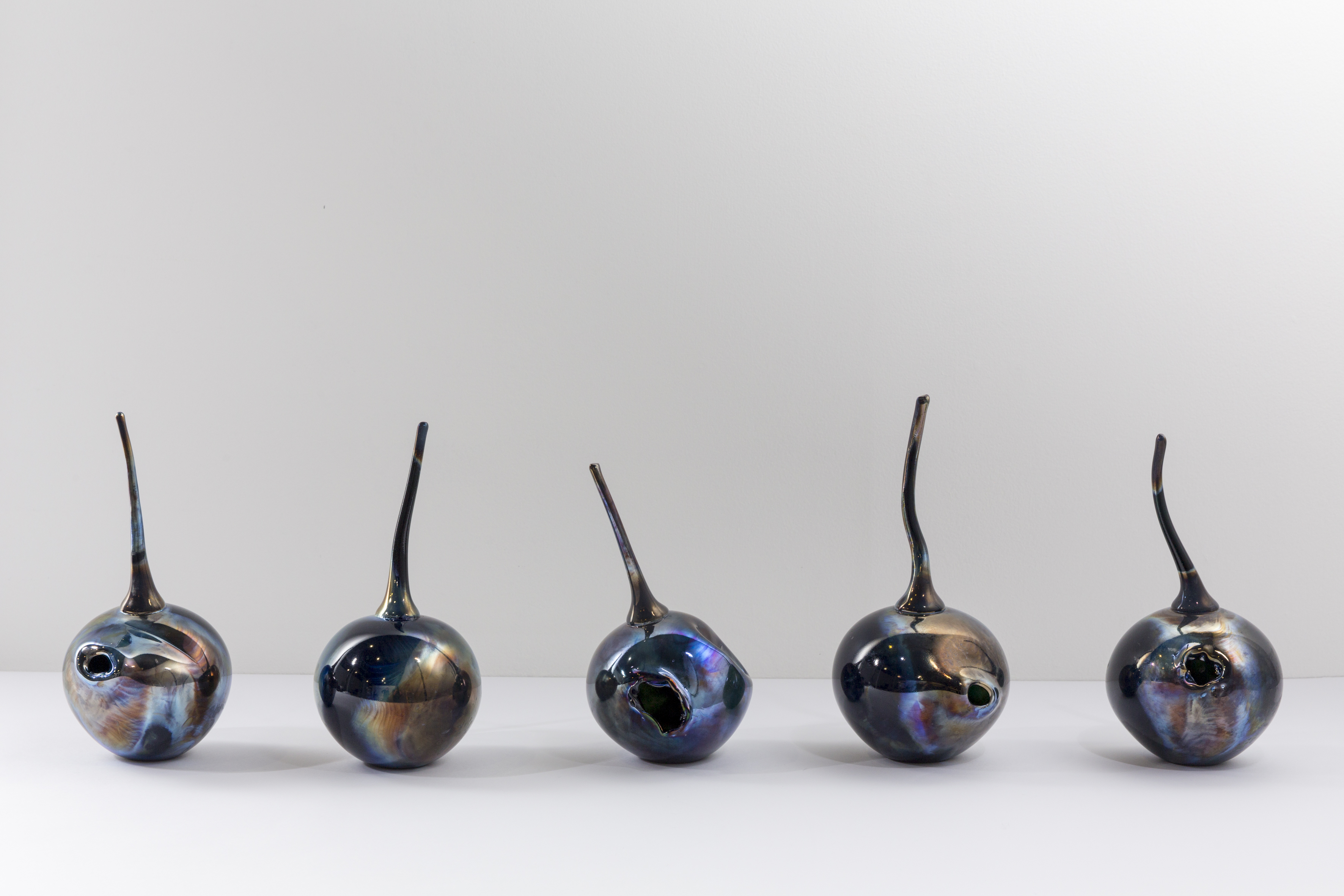 Yhonnie SCARCE 'Only a mother could love them' 2016, hand blown glass, 25 x 15cm diameter each (variable sizes - approx.). Monash University Collection. Purchased by the Monash Business School 2017. Courtesy of Monash University Museum of Art. Courtesy of the artist and THIS IS NO FANTASY, Melbourne.