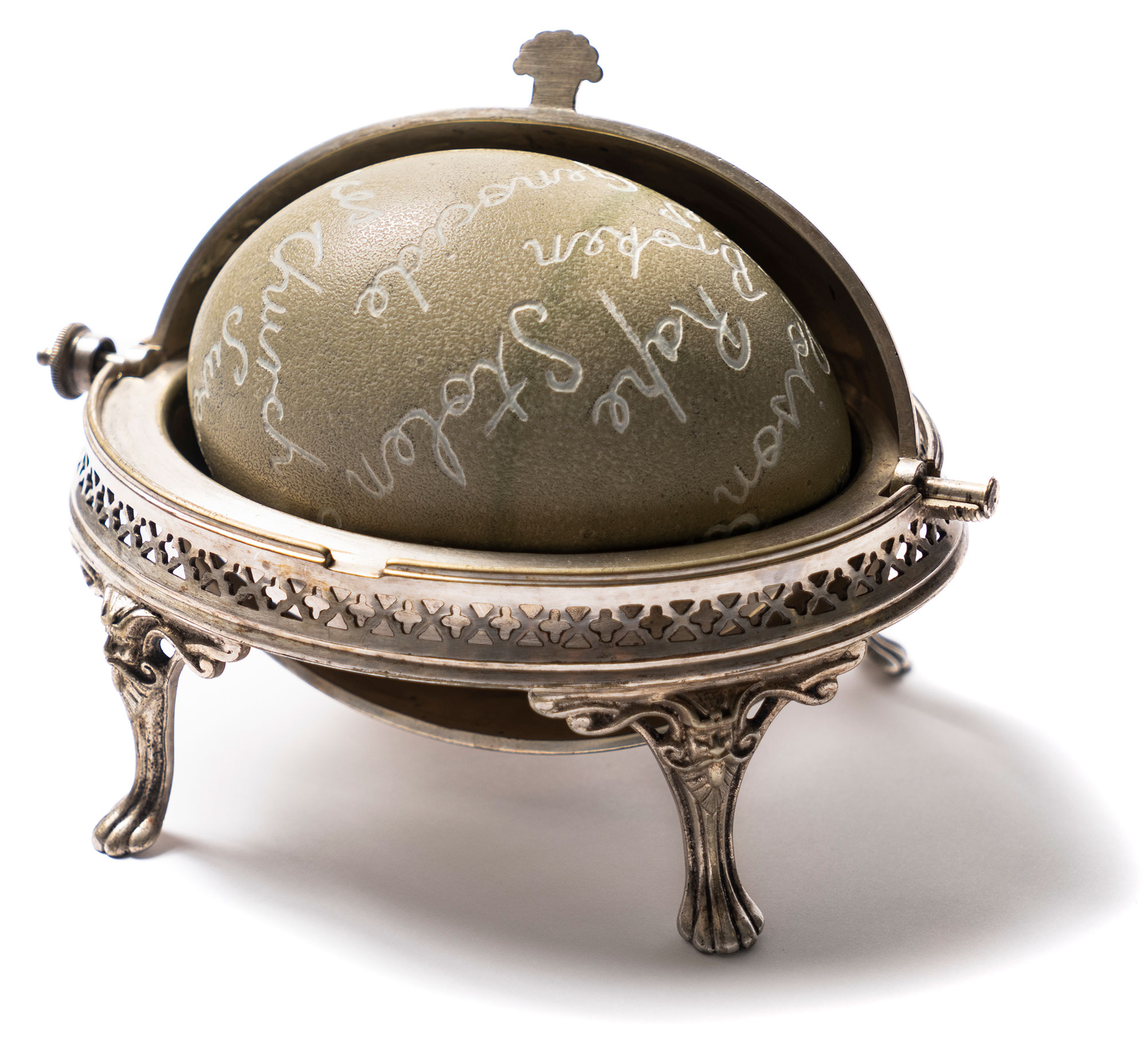 Glennys BRIGGS 'Swallow these words' 2020 | emu egg (etched) and silver sweet dish | Courtesy of the artist | Photo by Louis Lim