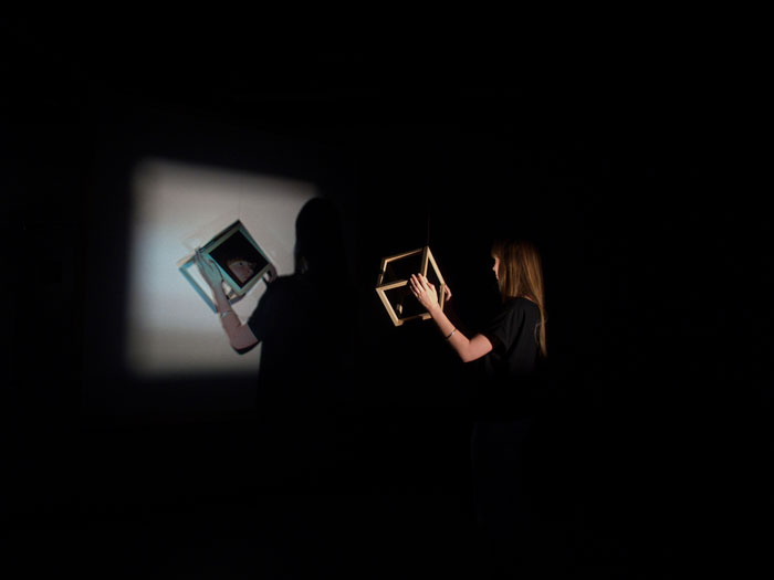 Caitlin FRANZMANN 'Light render' 2012 | double projection, live video feed, timber, mirror | Courtesy of the artist